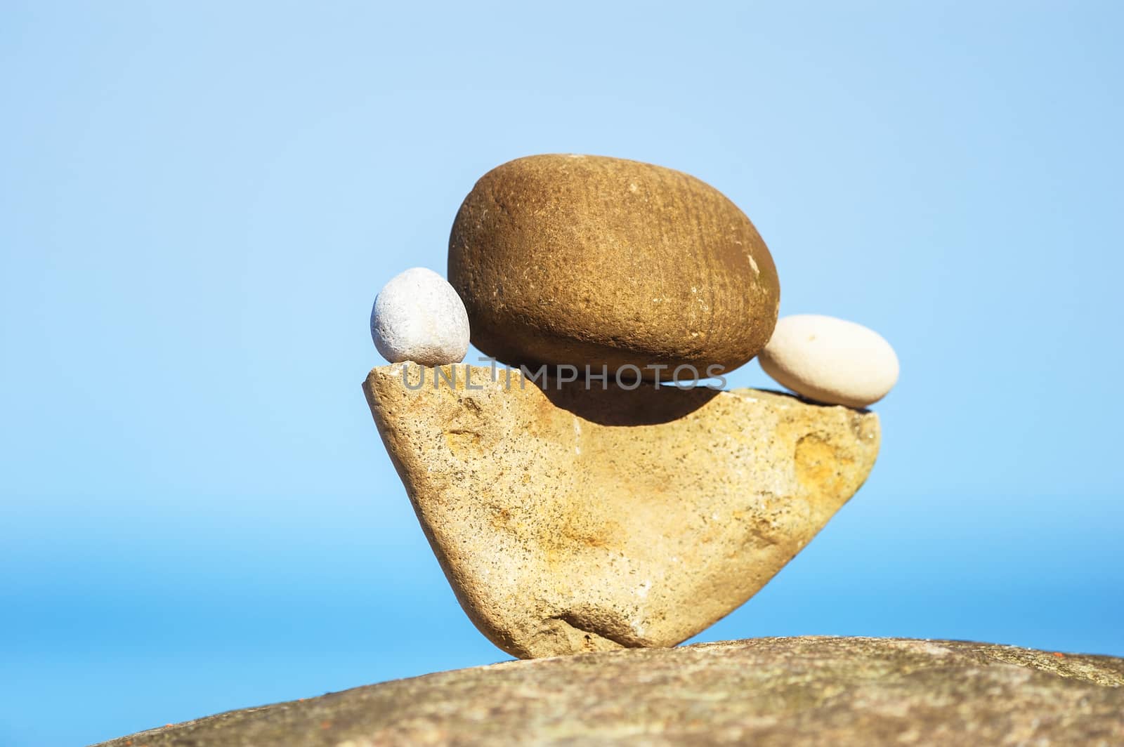 Balancing of stones each other on the coast