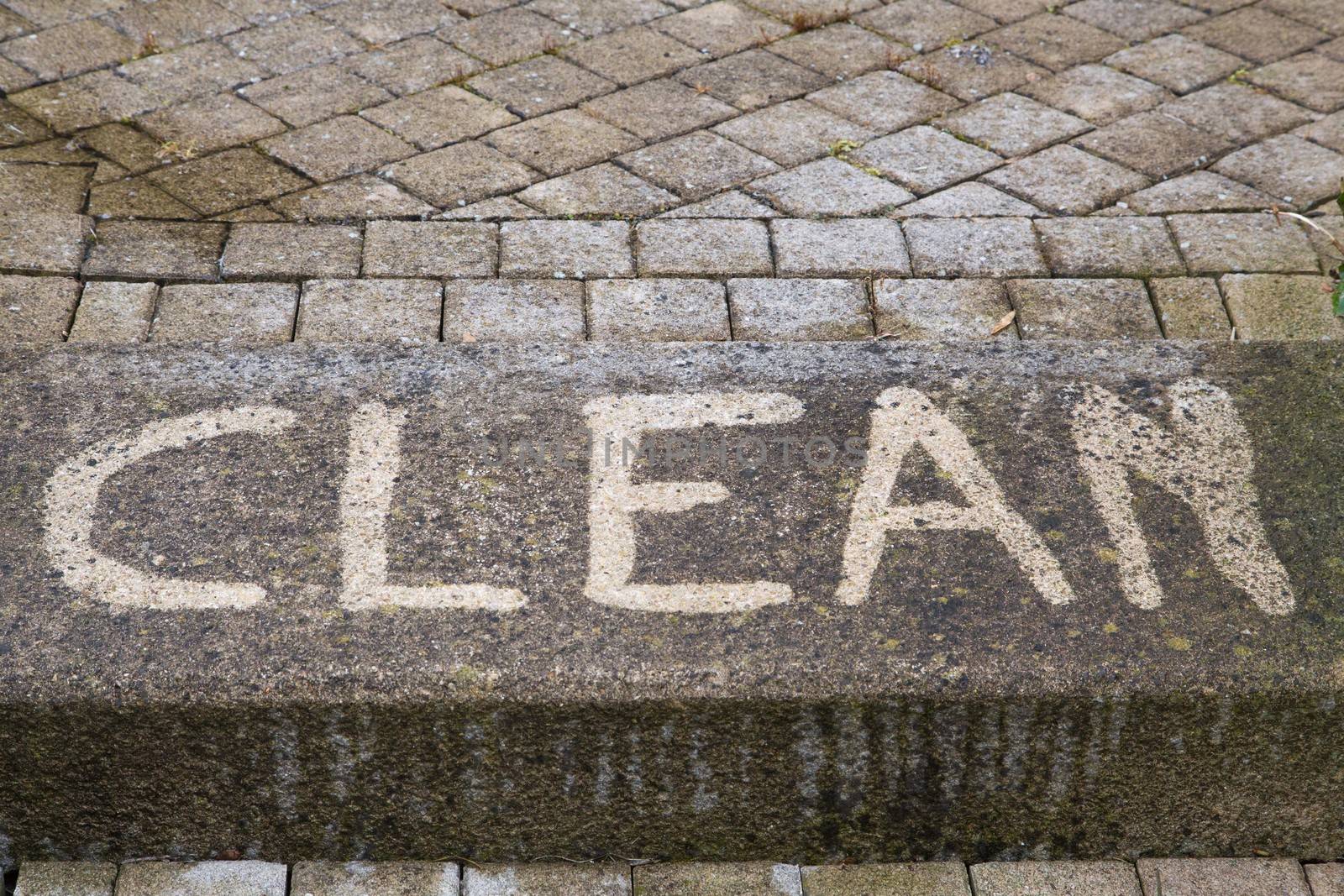 Outdoor floor cleaning with high pressure water jet