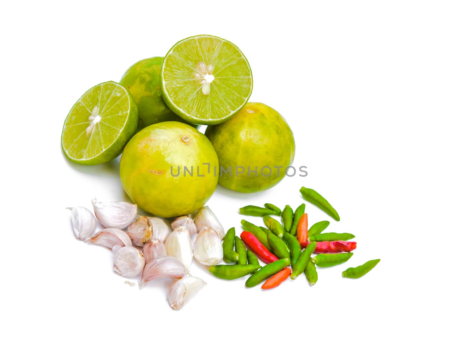 Chili peppers, garlic and lime on white background. Asian ingredients food