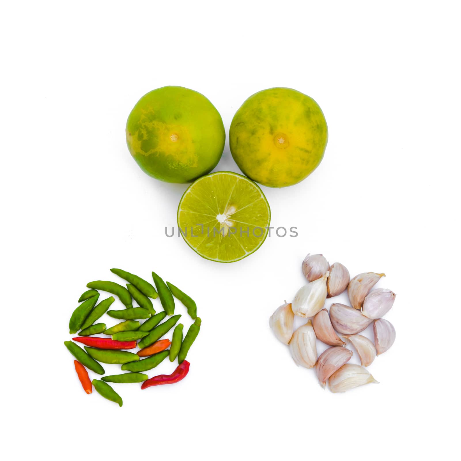 Chili peppers, garlic and lime on white background. Asian ingredients food