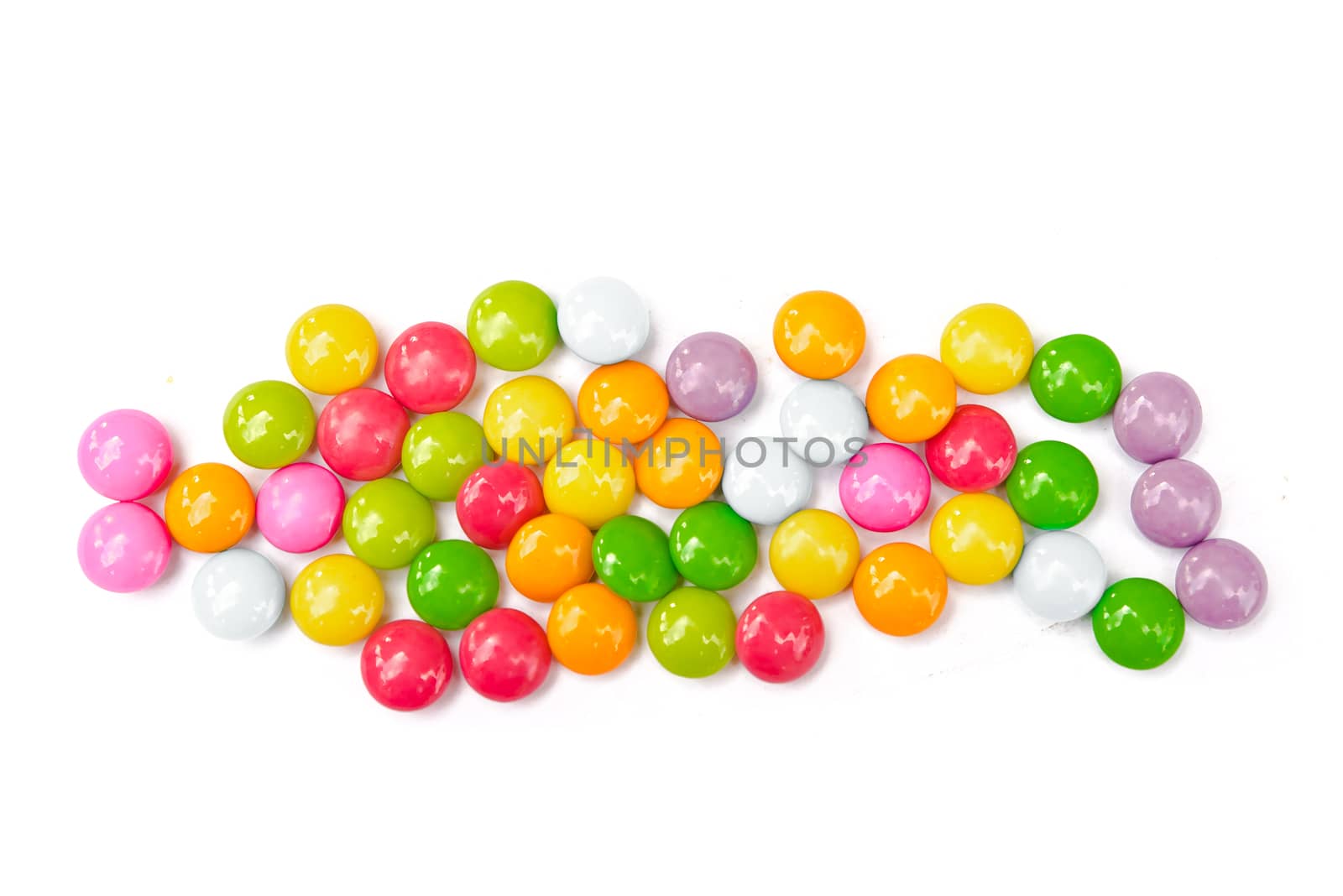 Colorful candies on white background