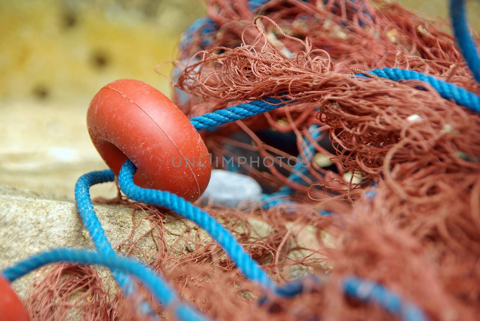 Closeup detail of a red fishing net used in Majorca