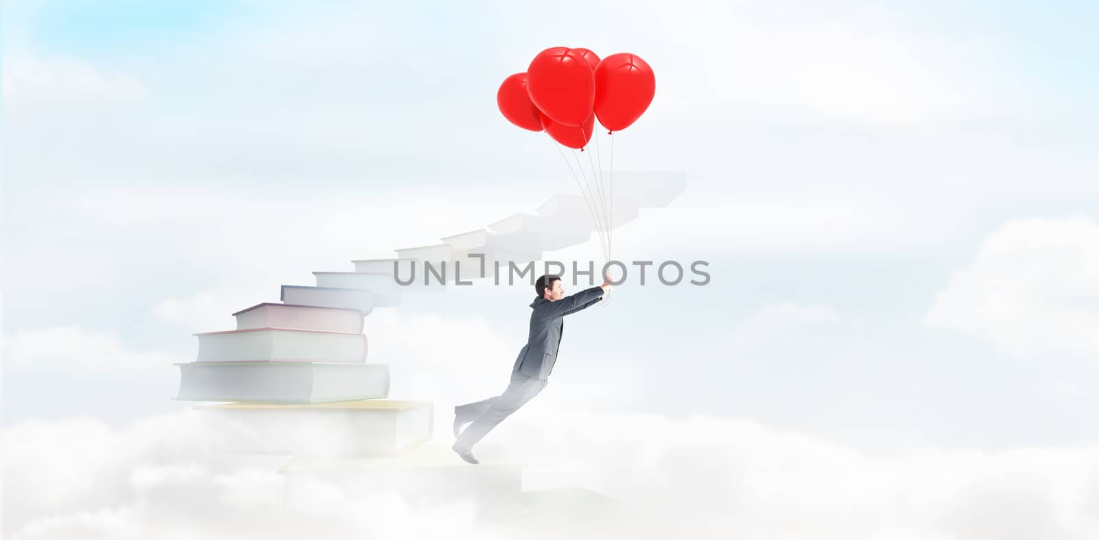 Businessman flying with balloons against blue sky with white clouds