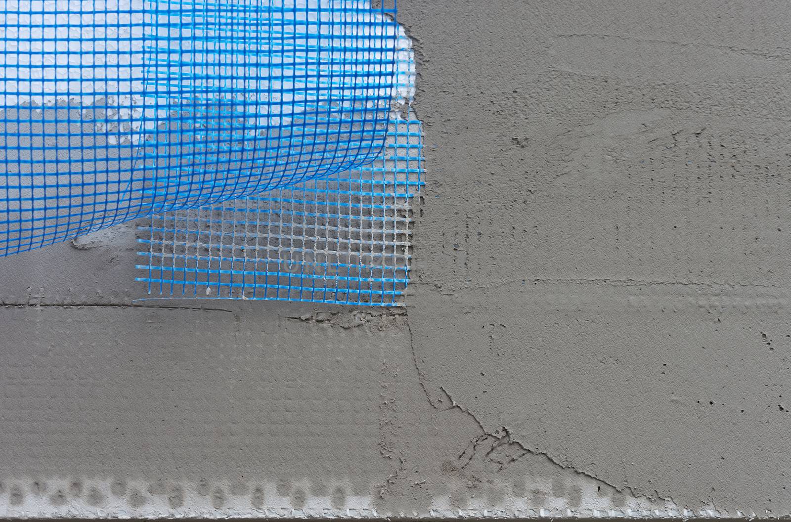 Polystyrene insulation boards covered with mesh covered and mortar