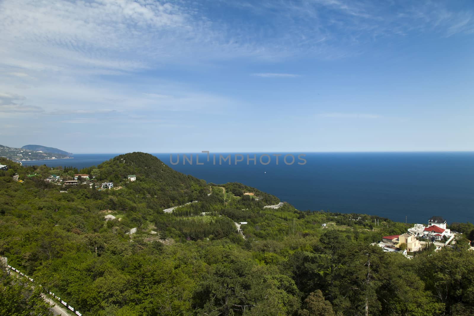 The seashore in the light of the sun from big height