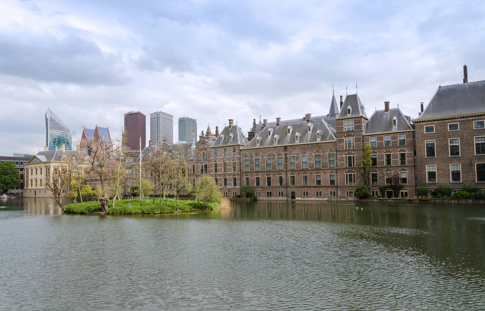 Dutch parliament buildings Binnenhof with skyscrapers in the background in The Hague, Netherlands,