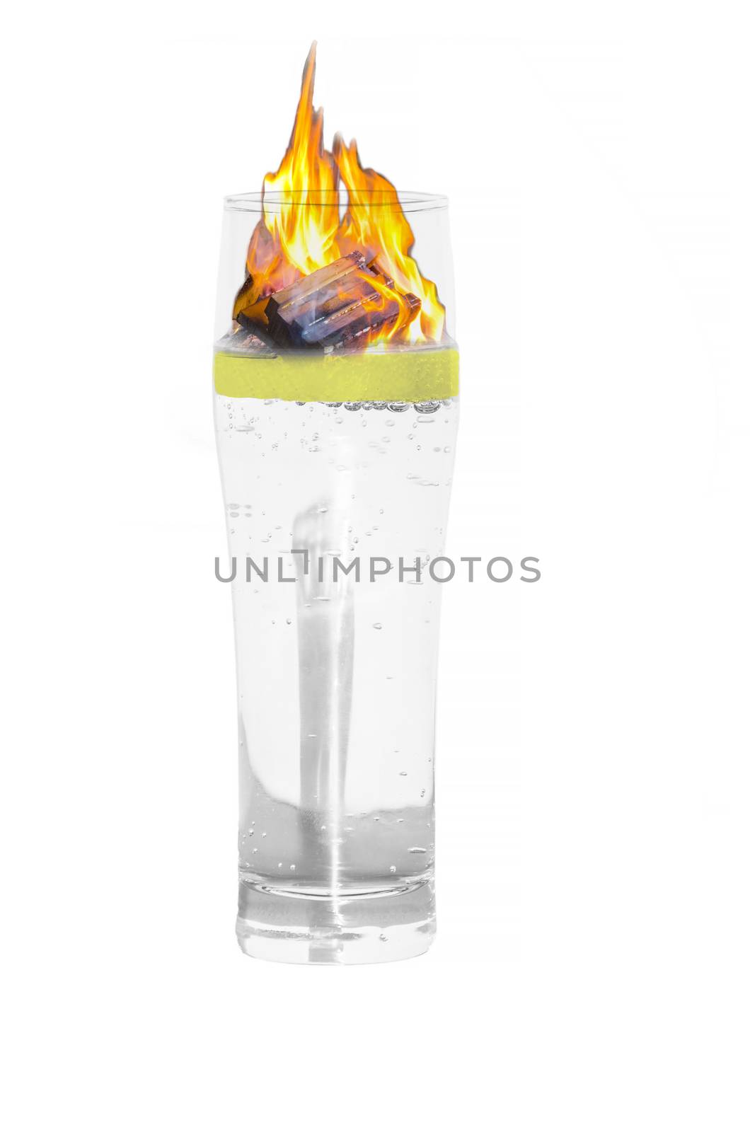 Mineral water glass isolated with burning slice of lemon