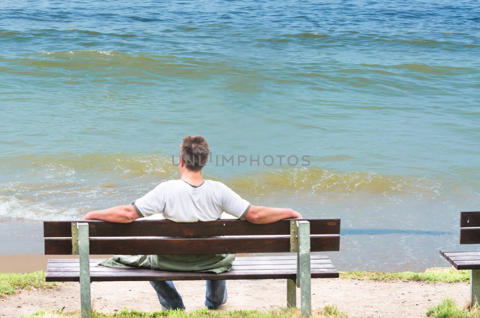  Man on bench, looking out to sea by JFsPic