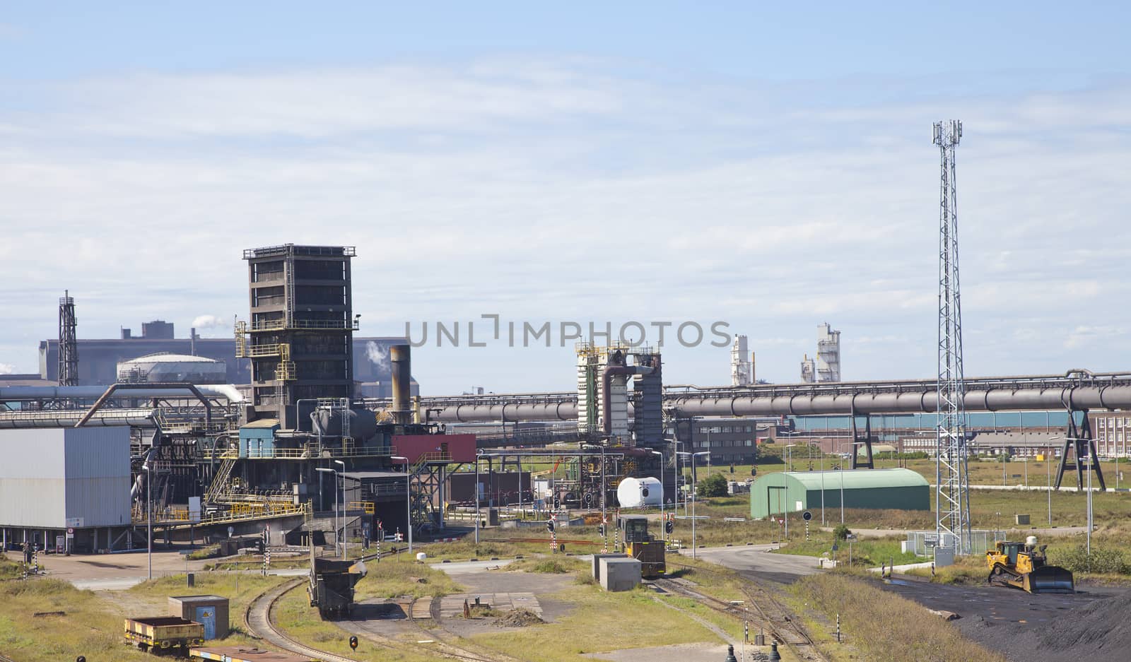 View at steel factory with blue sky