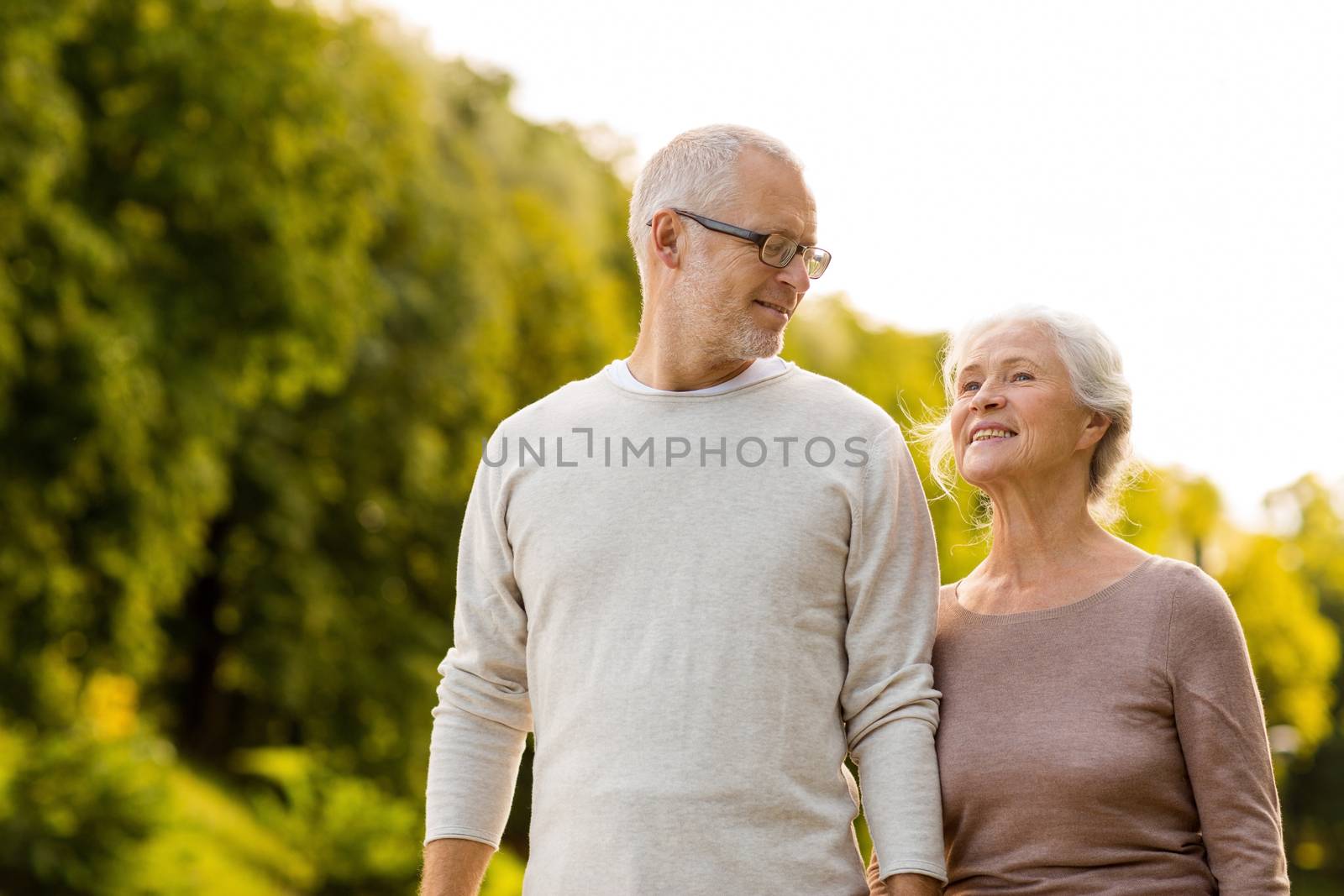 senior couple in park by dolgachov
