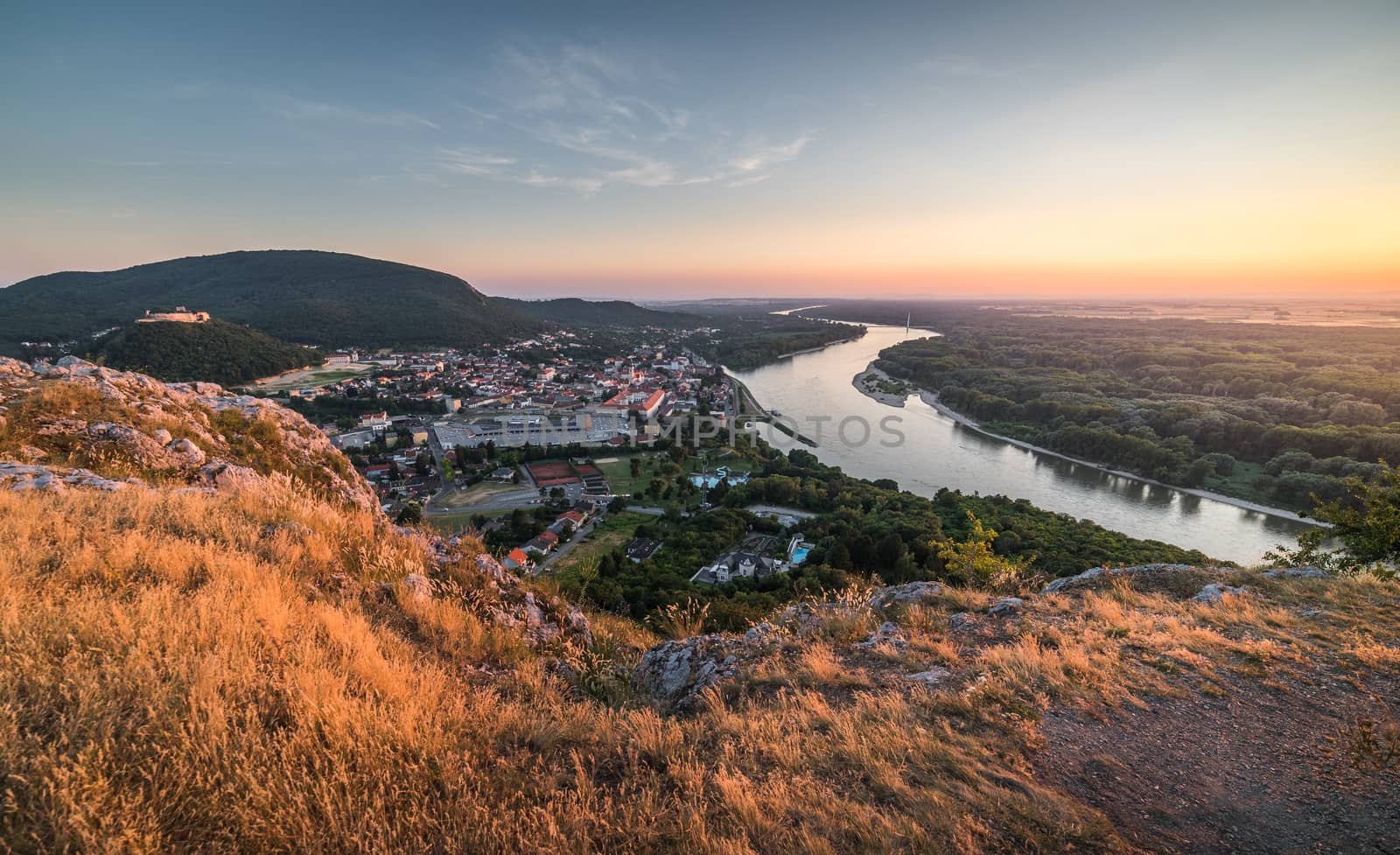 View of Small City of Hainburg an der Donau with Danube River as Seen from Braunsberg Hill at Beautiful Sunset