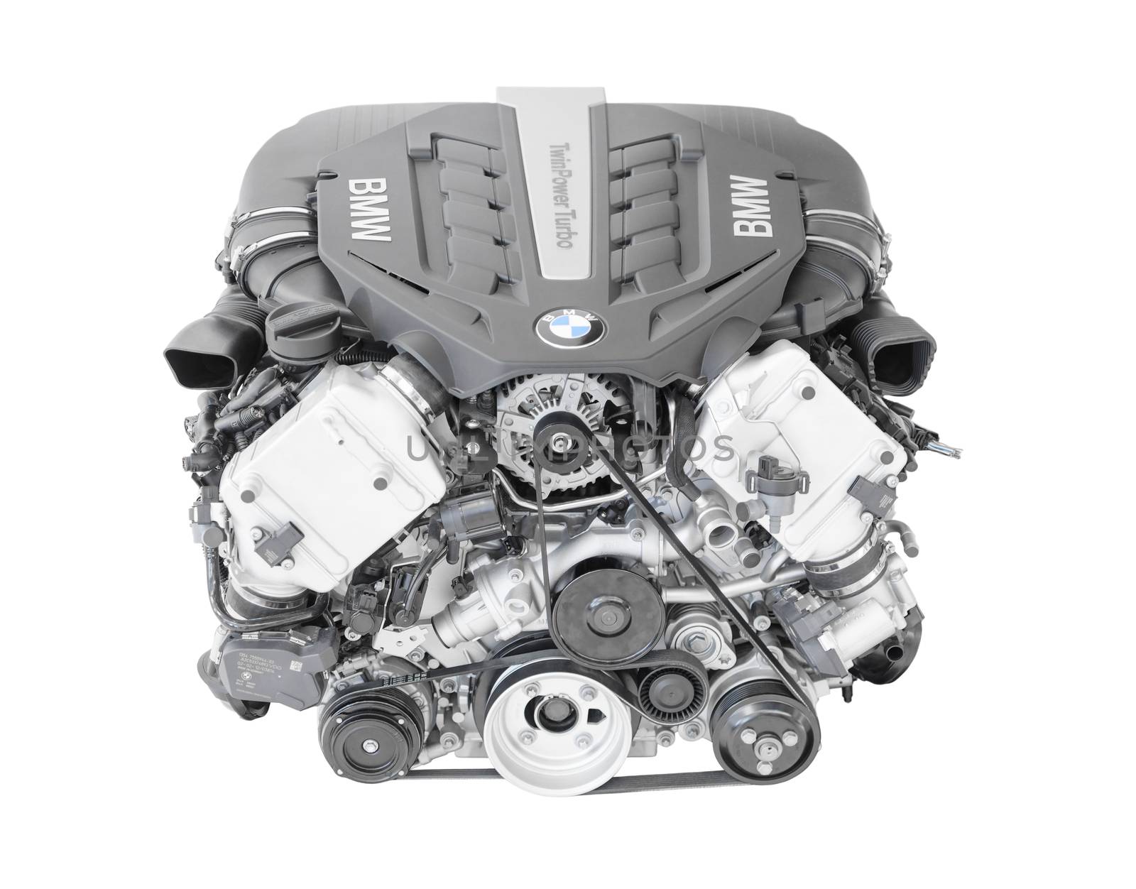 Munich, Germany - September 28, 2014: New modern flagship top model of irresistibly dynamic and incredibly efficient car engine. BMW TwinPower turbo V8-cylinder top-of-the-range petrol engine isolated on white.