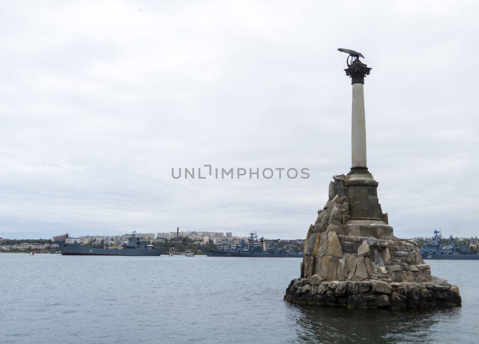 Monument to the flooded Russian ships in a bay