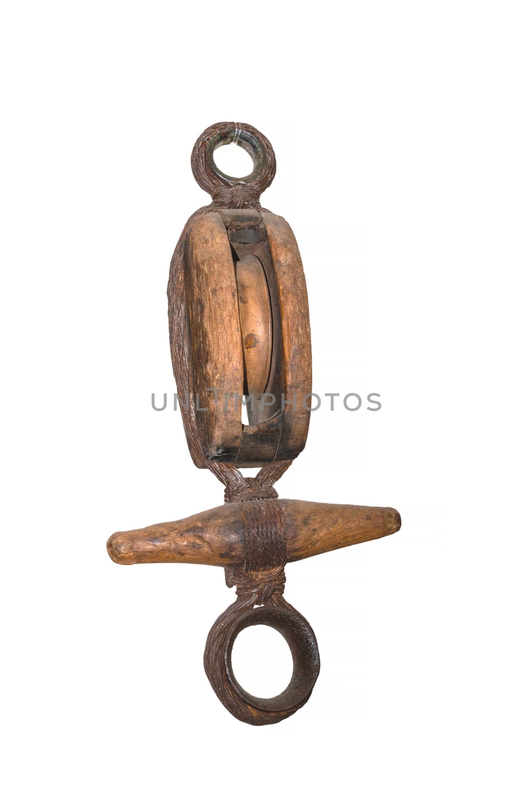 Old antique wooden pulley with pulley.