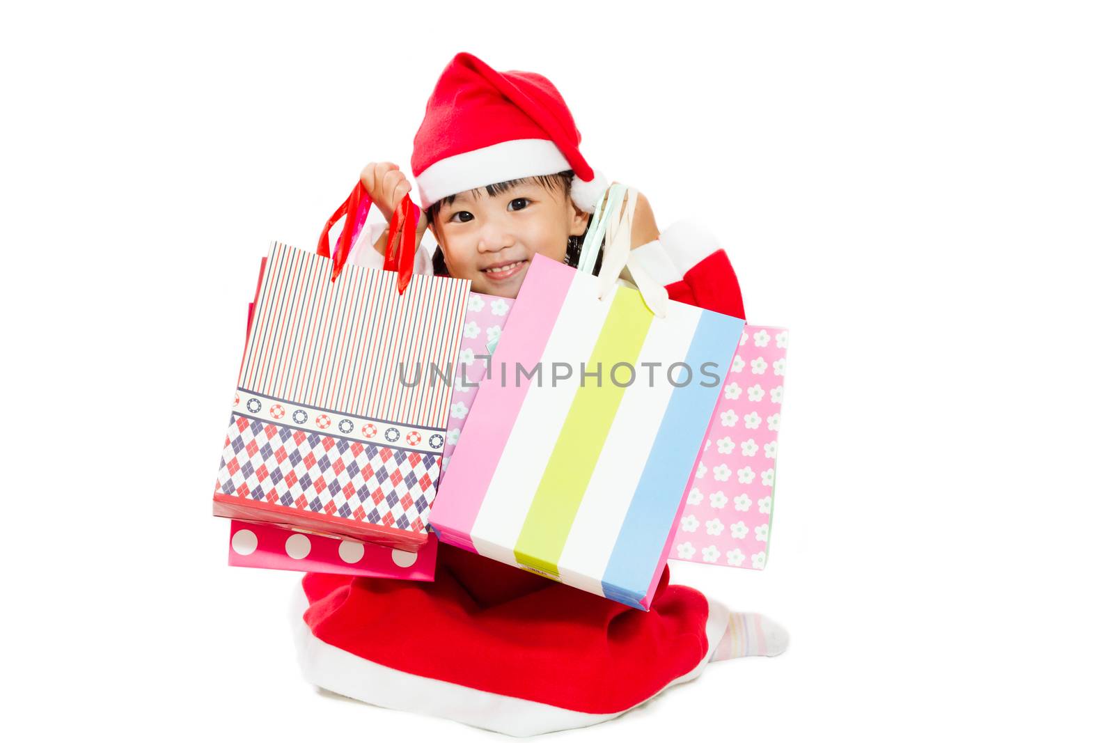 Asian Little Santa Claus with shopping bag by kiankhoon