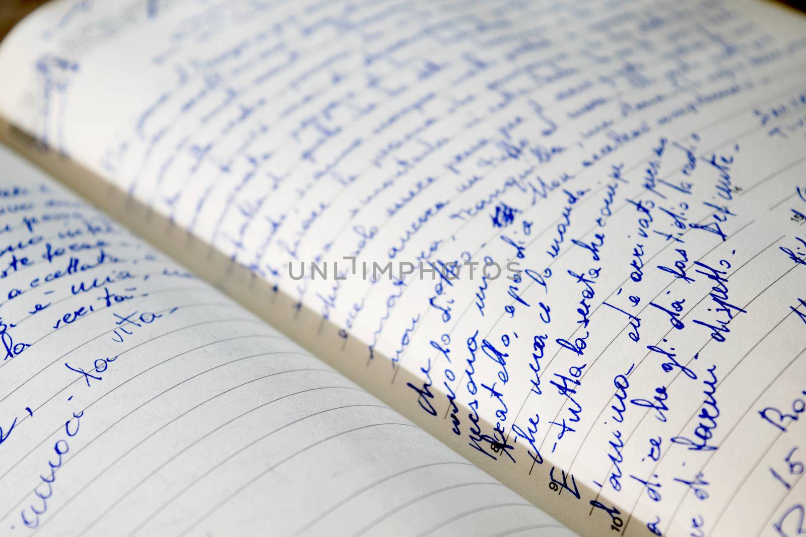 old handwritten diary with personal notes