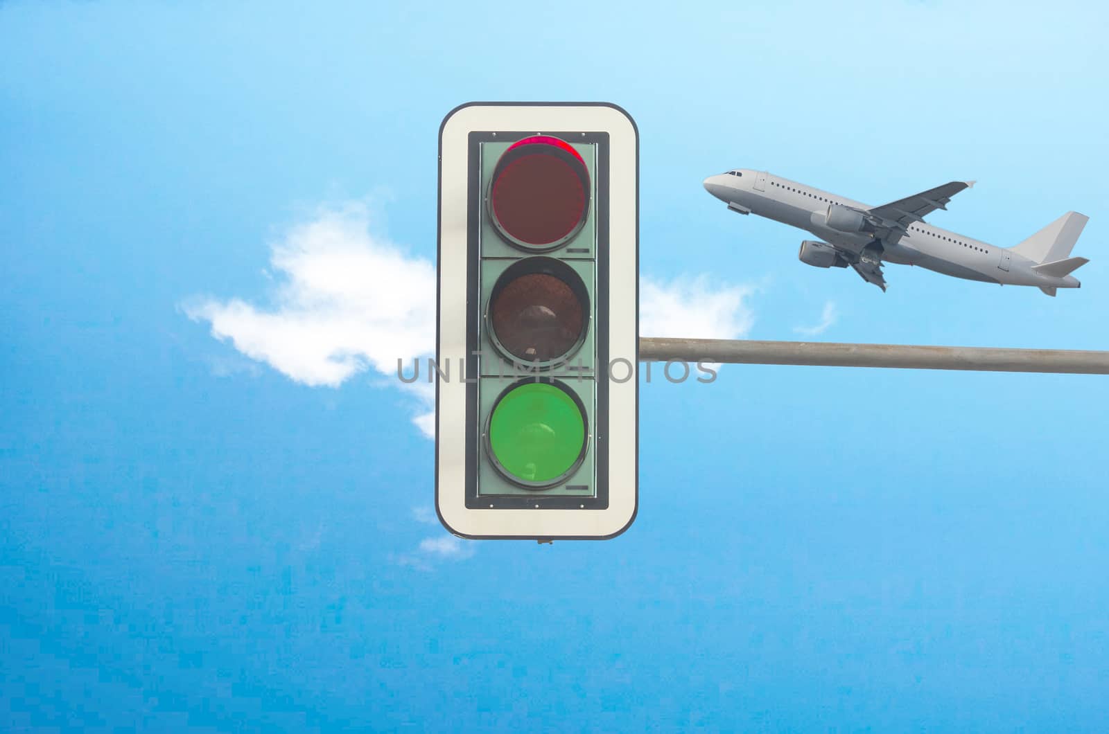  Green traffic light, airplane in background  by JFsPic