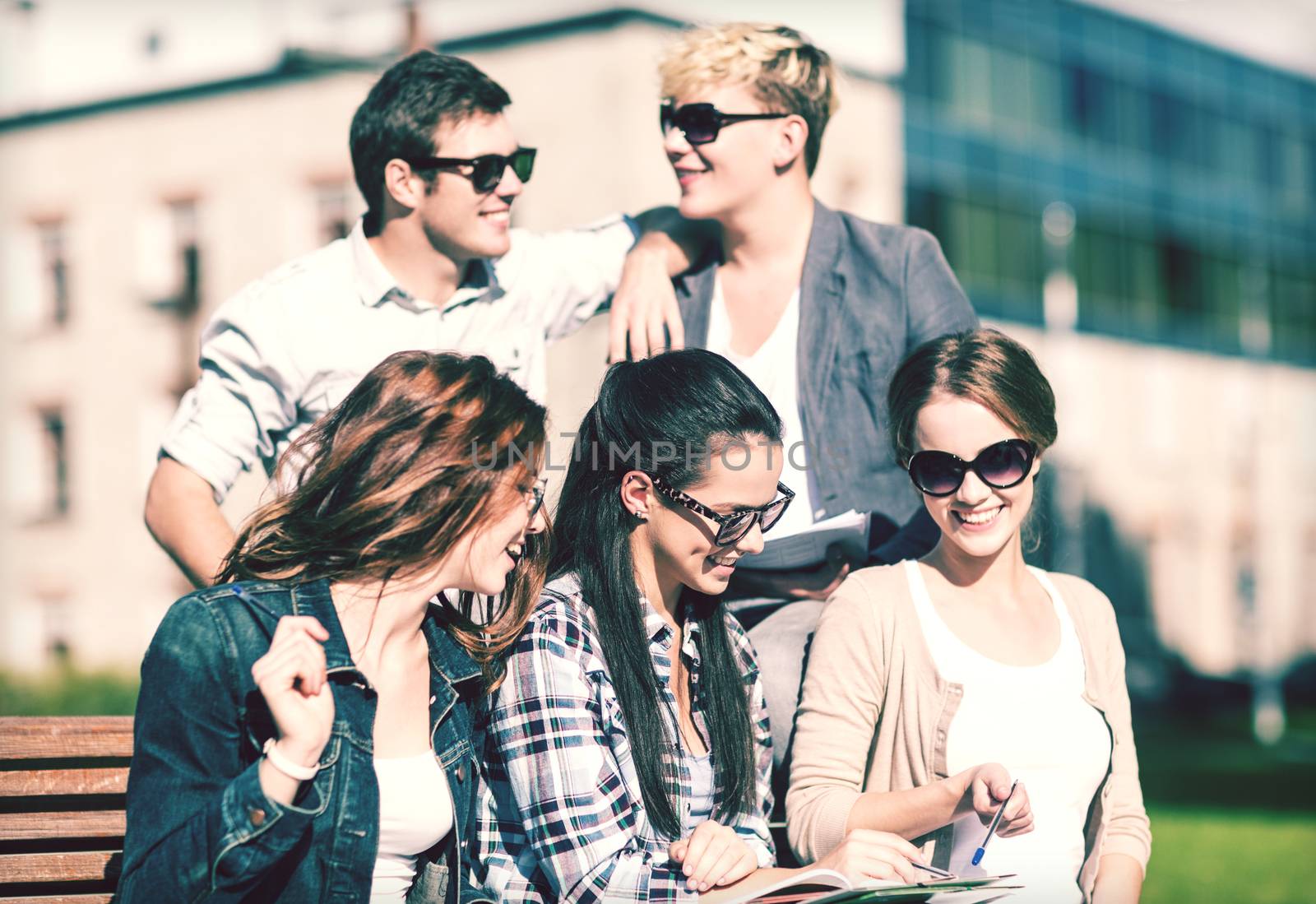 group of students or teenagers hanging out by dolgachov