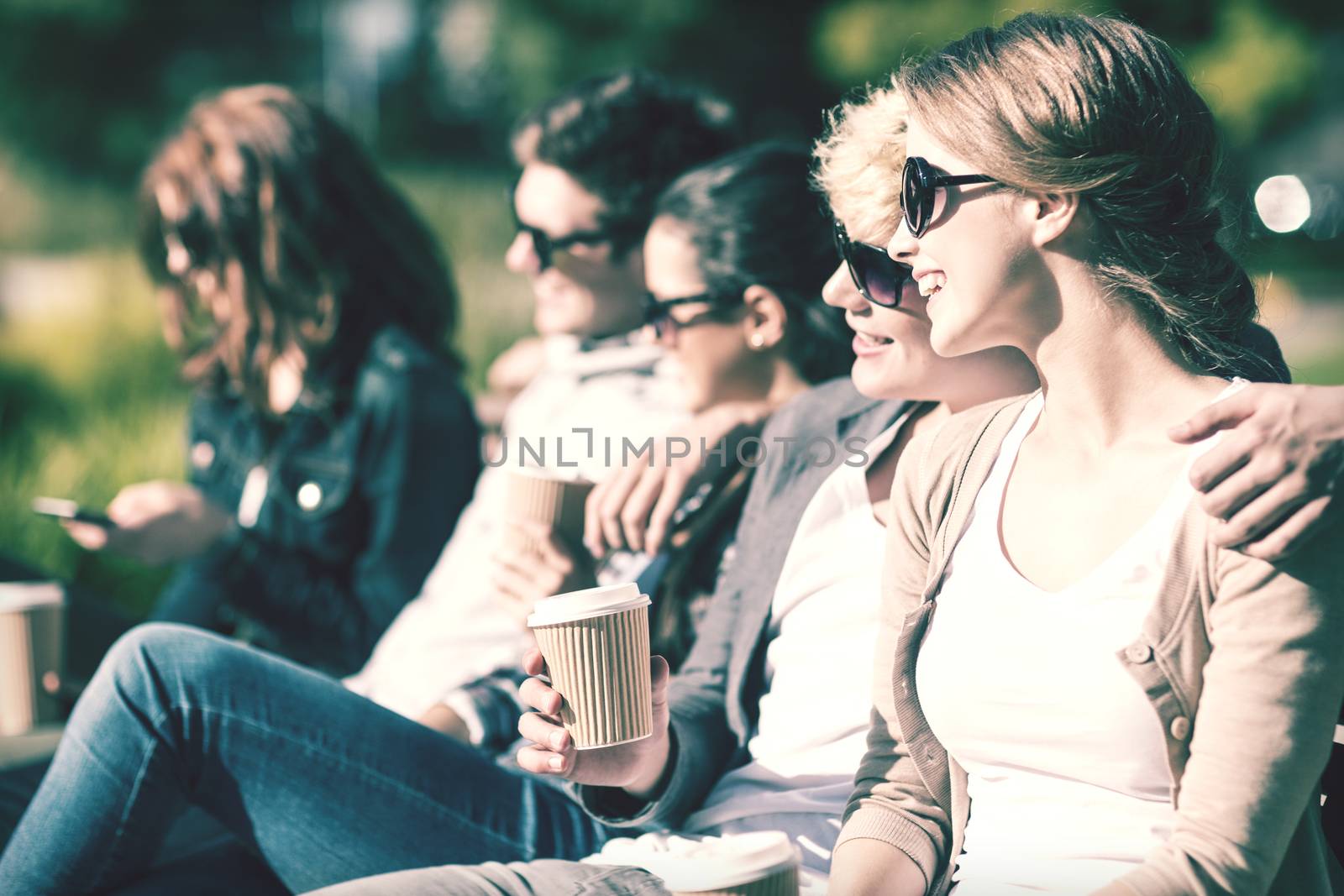 group of students or teenagers hanging out by dolgachov