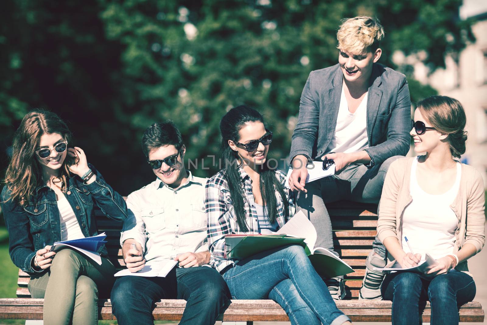 group of students or teenagers hanging out by dolgachov