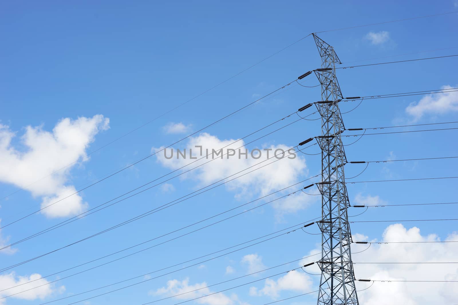 High voltage electric tower on sky background