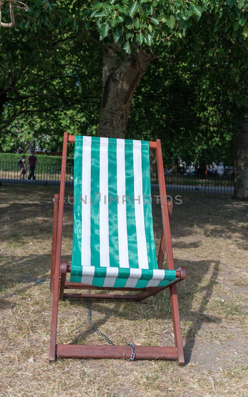 Lawn chair in a park.