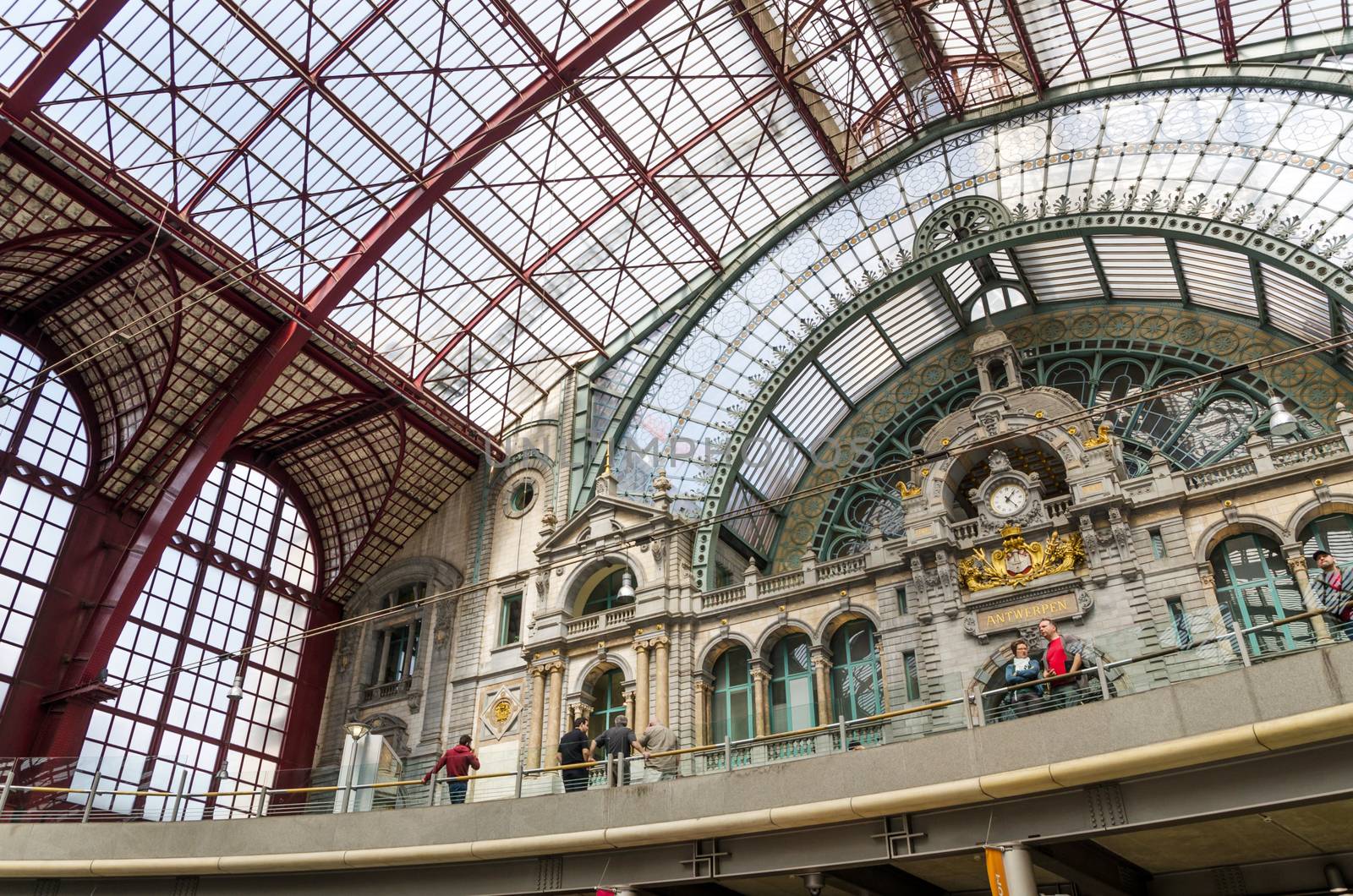 Antwerp, Belgium - May 11, 2015: People in Main hall of Antwerp Central station by siraanamwong
