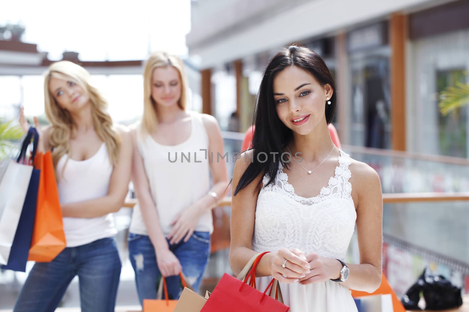 Women shopping in mall by ALotOfPeople