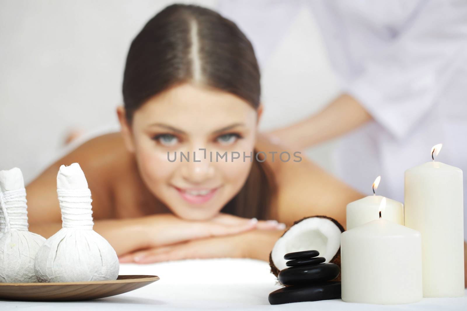 Woman getting spa massage by ALotOfPeople