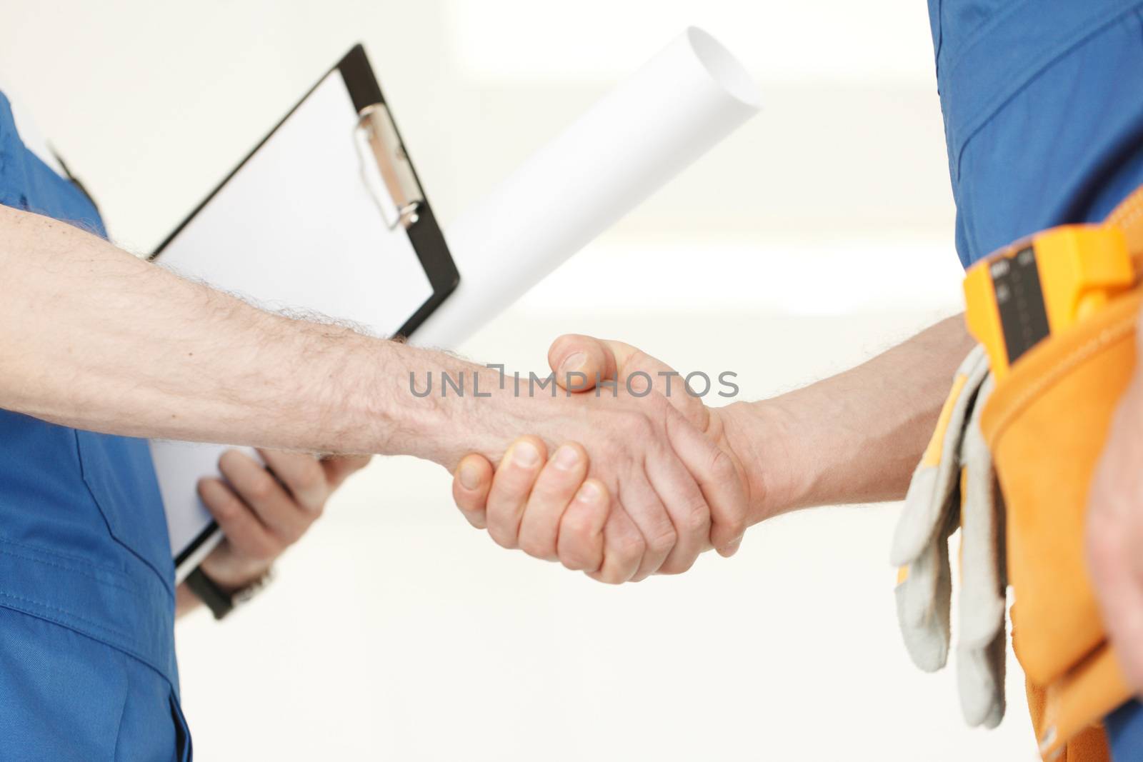 workmen handshake by ALotOfPeople
