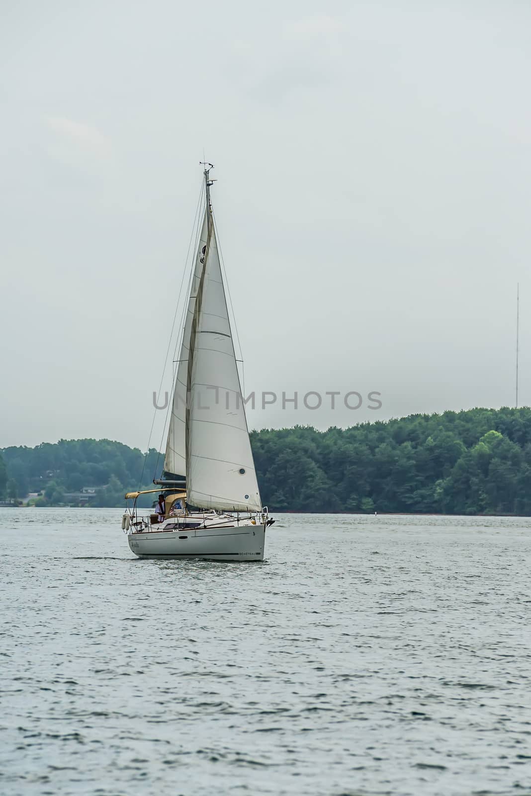 sail boat on large lake by digidreamgrafix