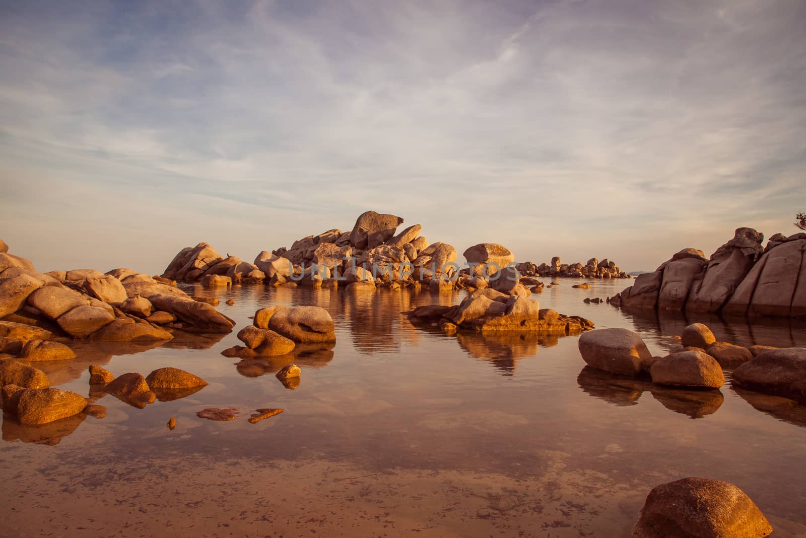 Trees and rocks at the beach of Palombaggia, the most famous beach of Corsica