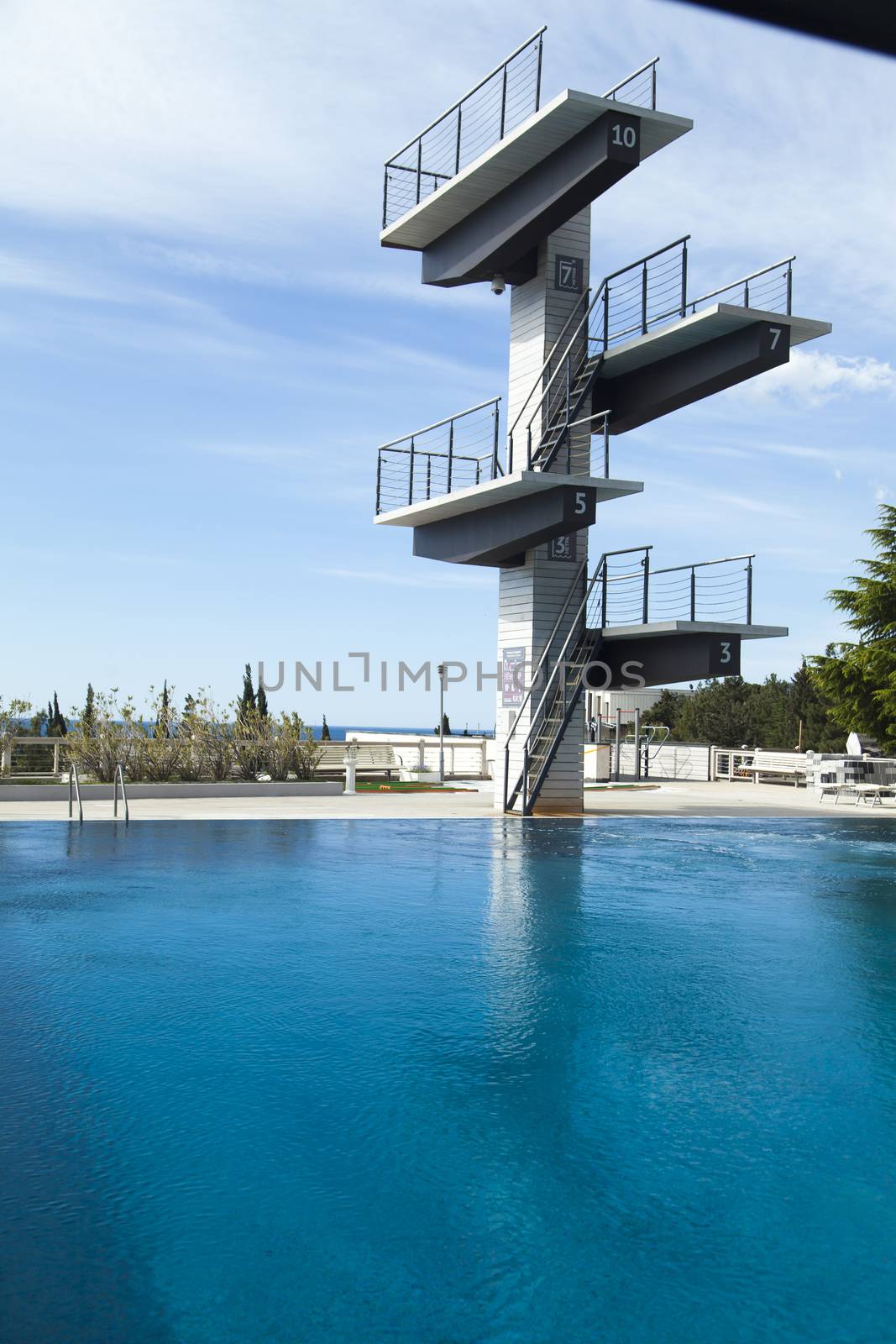 The swimming pool under beams of the sun is ready to competitions and rest