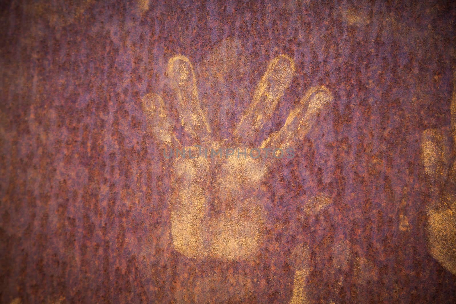 Handprints in ocher in Roussillion in Provence famous for the ocher quarries
