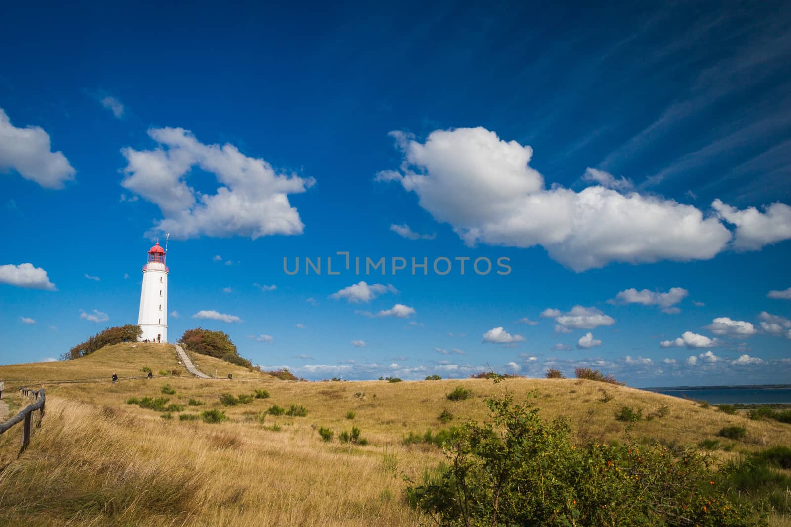Lighthouse Dornbusch on the island of Hiddensee in blue sky