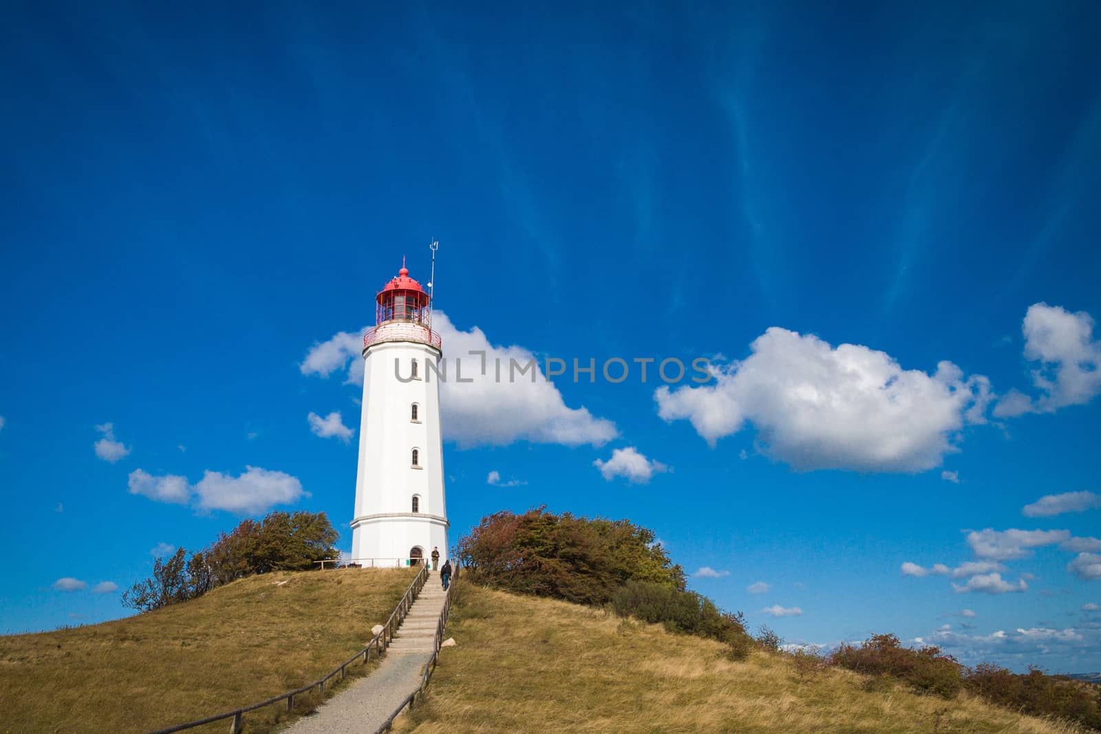 Lighthouse Dornbusch on the island of Hiddensee in blue sky