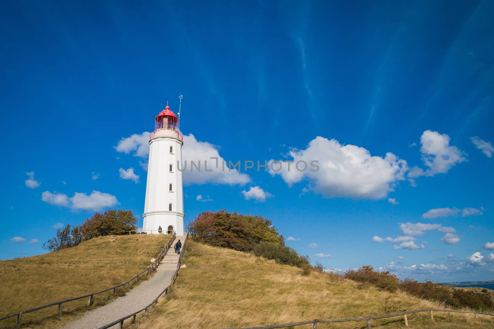 Lighthouse Dornbusch on the island of Hiddensee in blue sky