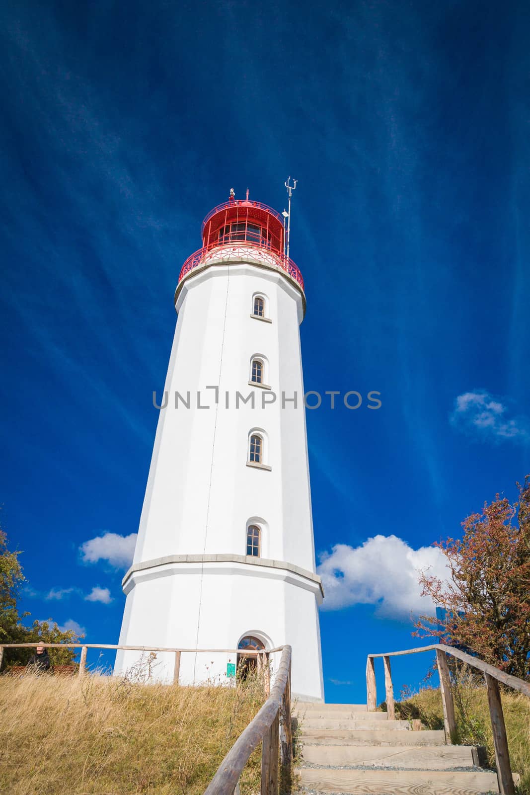 Lighthouse Dornbusch on the island of Hiddensee in blue sky