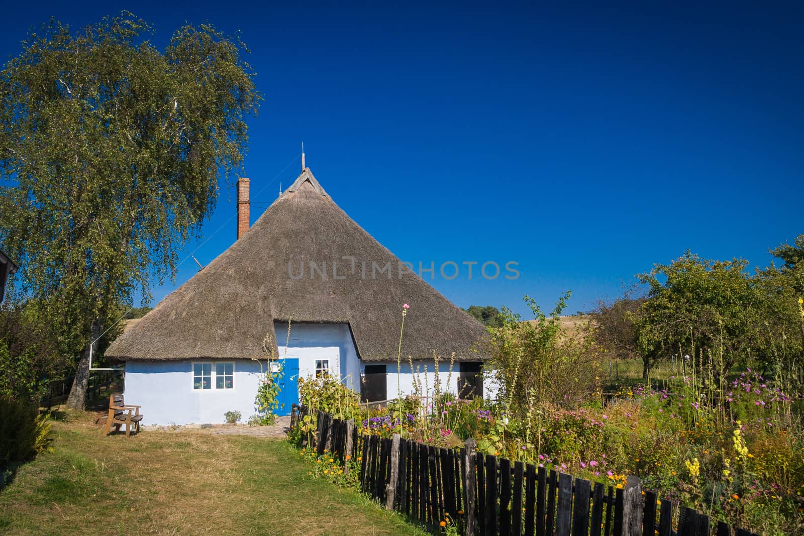 Old house with thatched roof on the island of Rügen