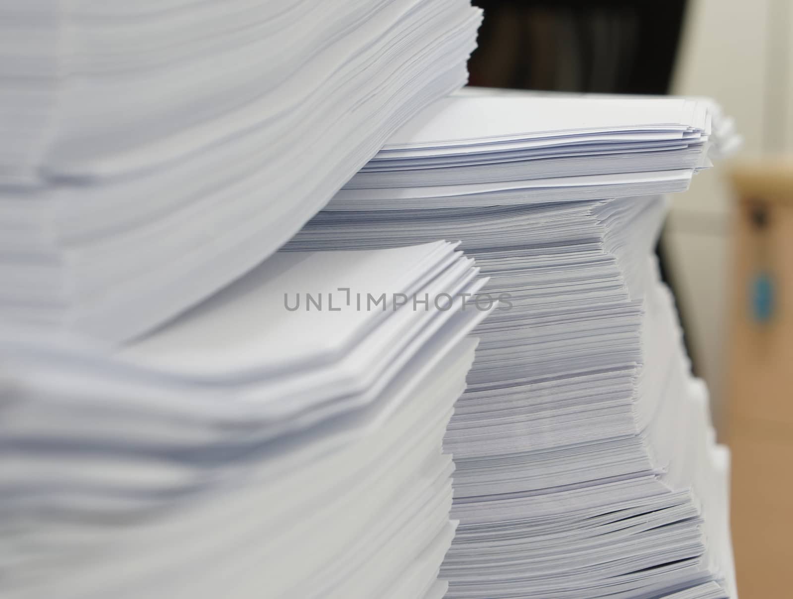 Stack of white papers by ninun