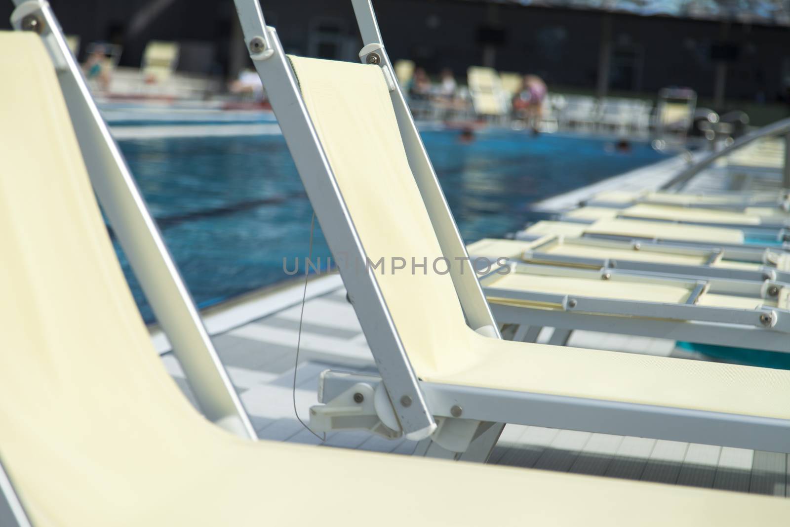 The swimming pool under beams of the sun is ready to competitions and rest