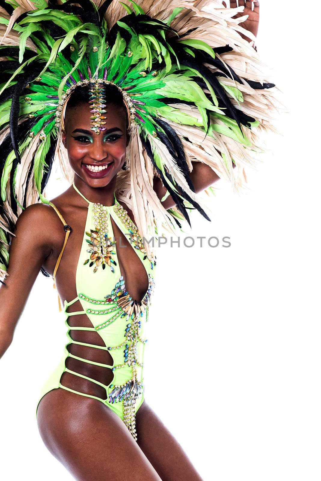 Side pose of cheerful carnival dancer woman 