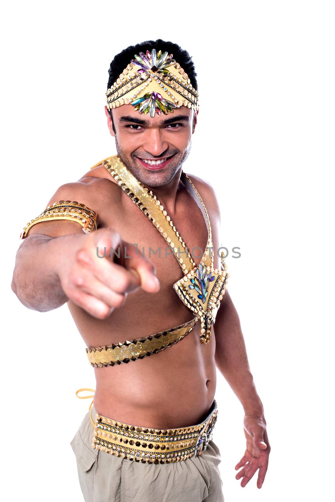 Handsome male samba dancer pointing forward over white