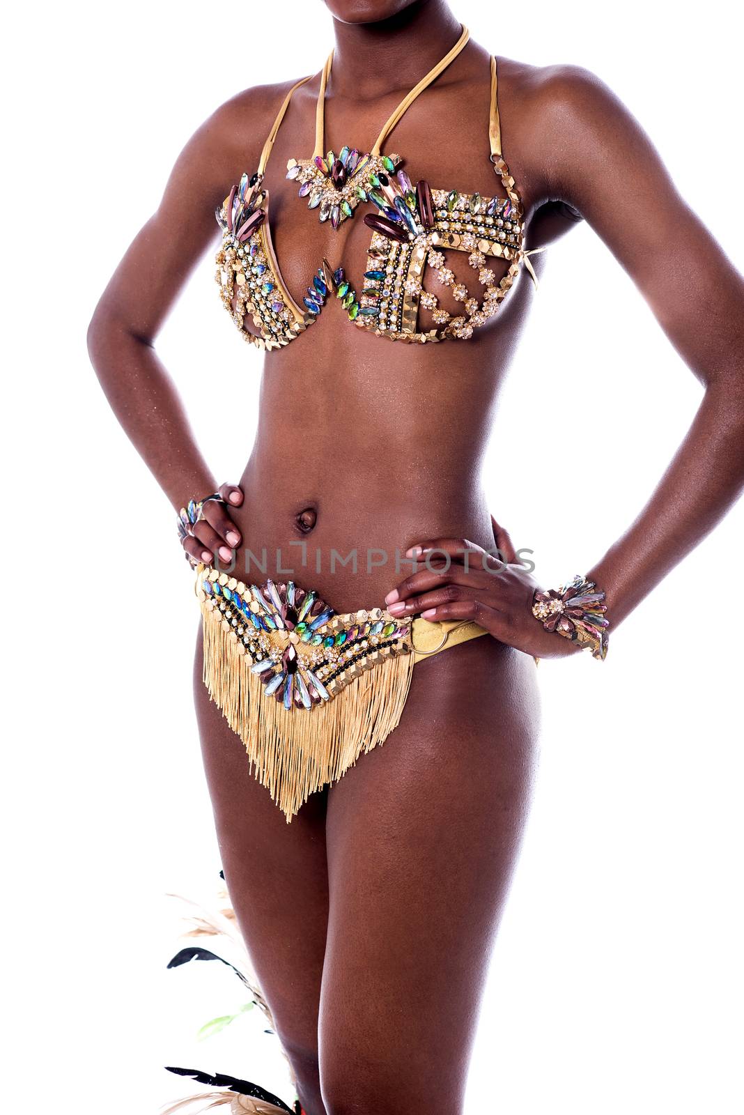 Mid section of samba dancer. by stockyimages