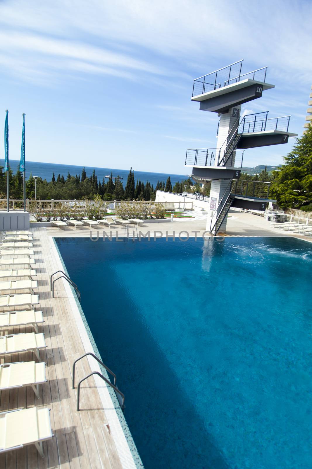 The swimming pool under beams of the sun is ready to competitions and rest