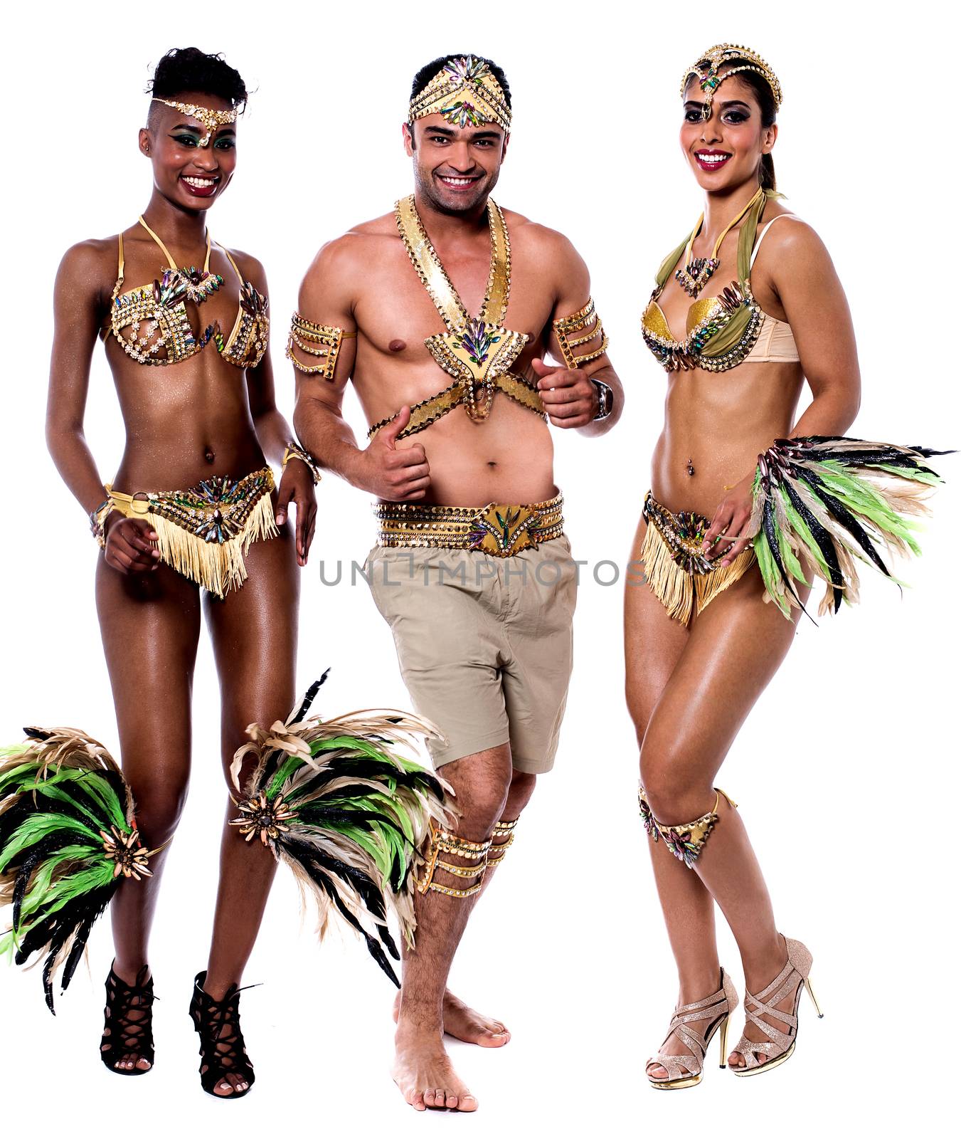 Young samba dancers in performance over white