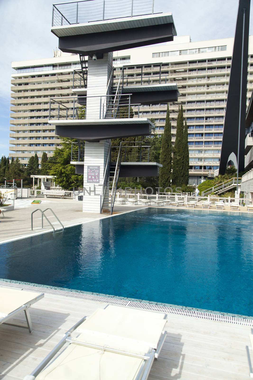 The swimming pool under beams of the sun is ready to competitions and rest