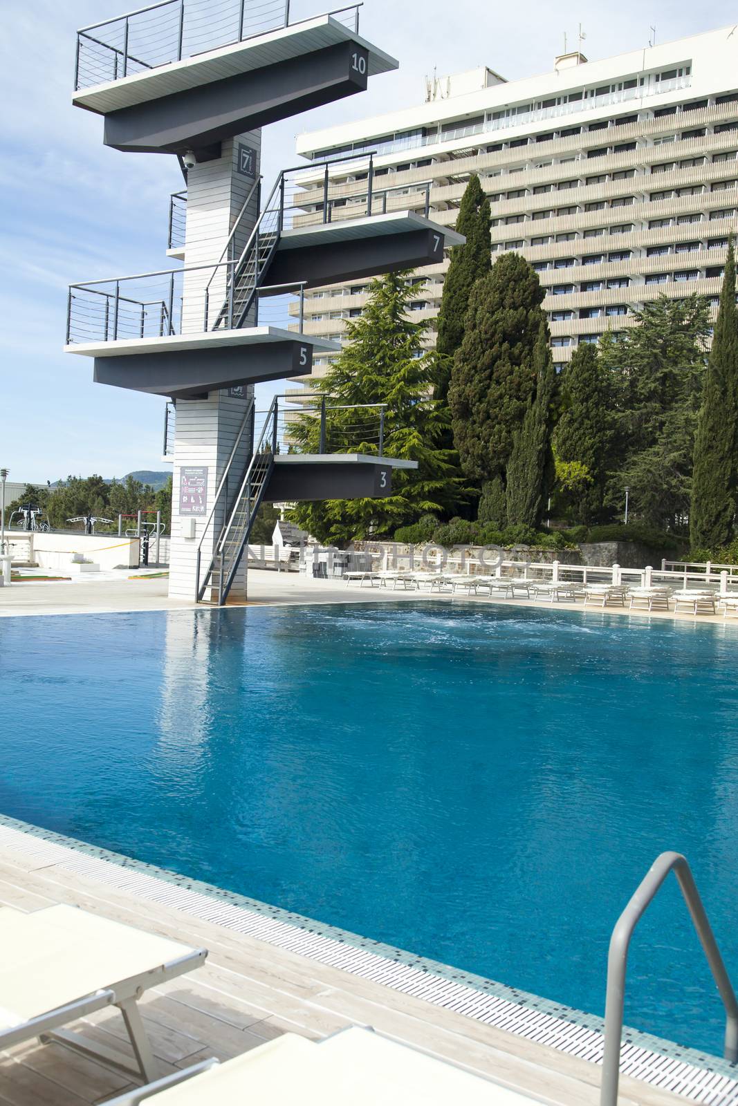 The swimming pool under beams of the sun is ready to competitions and rest