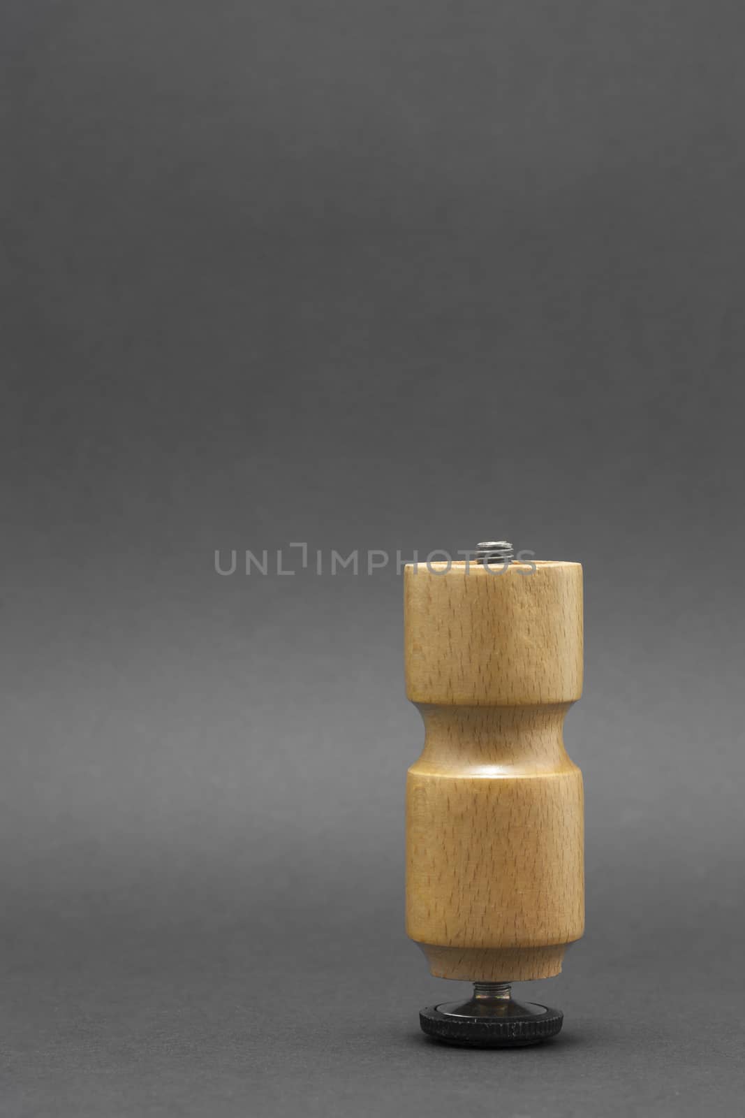 Leg for furniture isolated on a black background