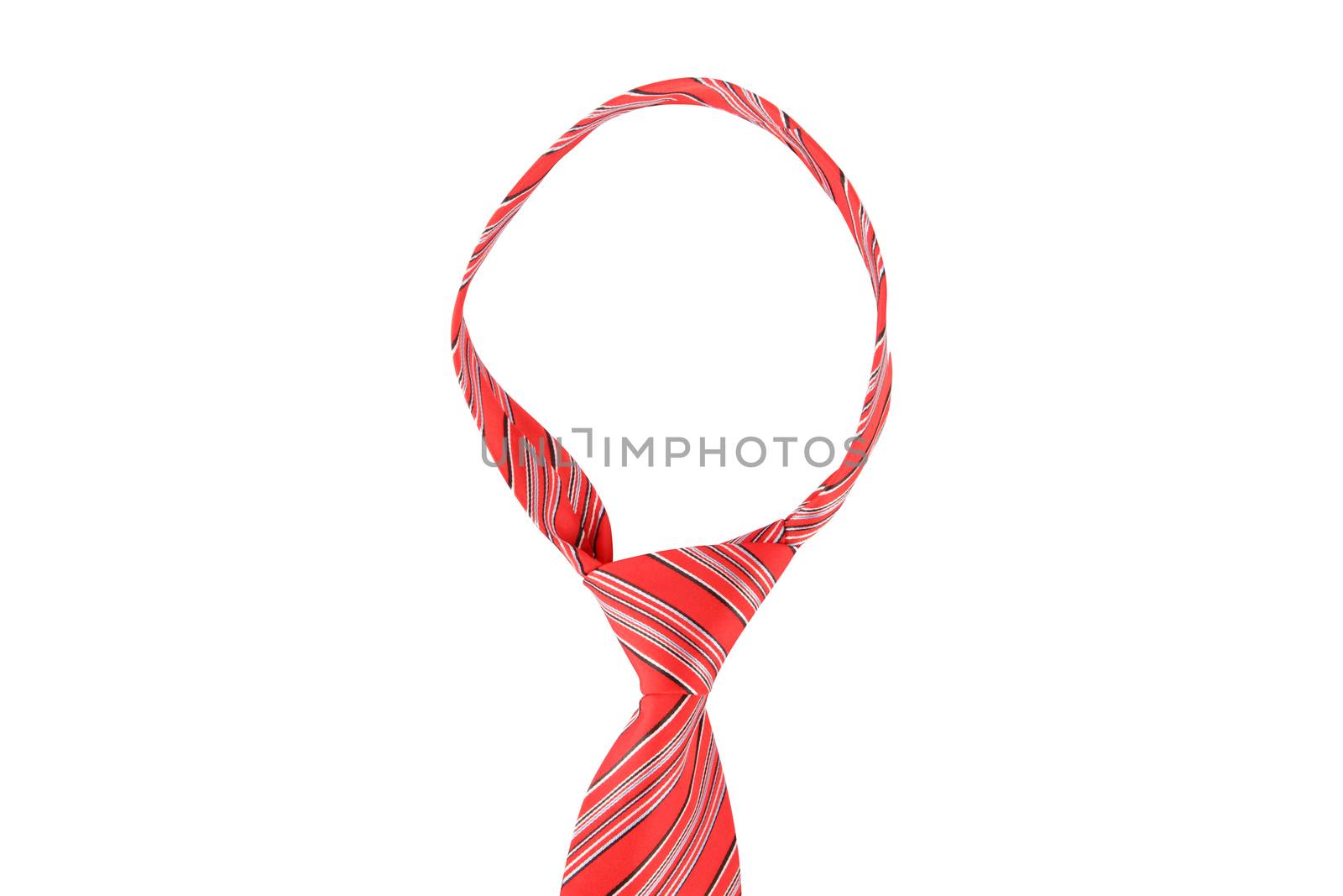 Close up front view of tied up red striped necktie, isolated on white background.